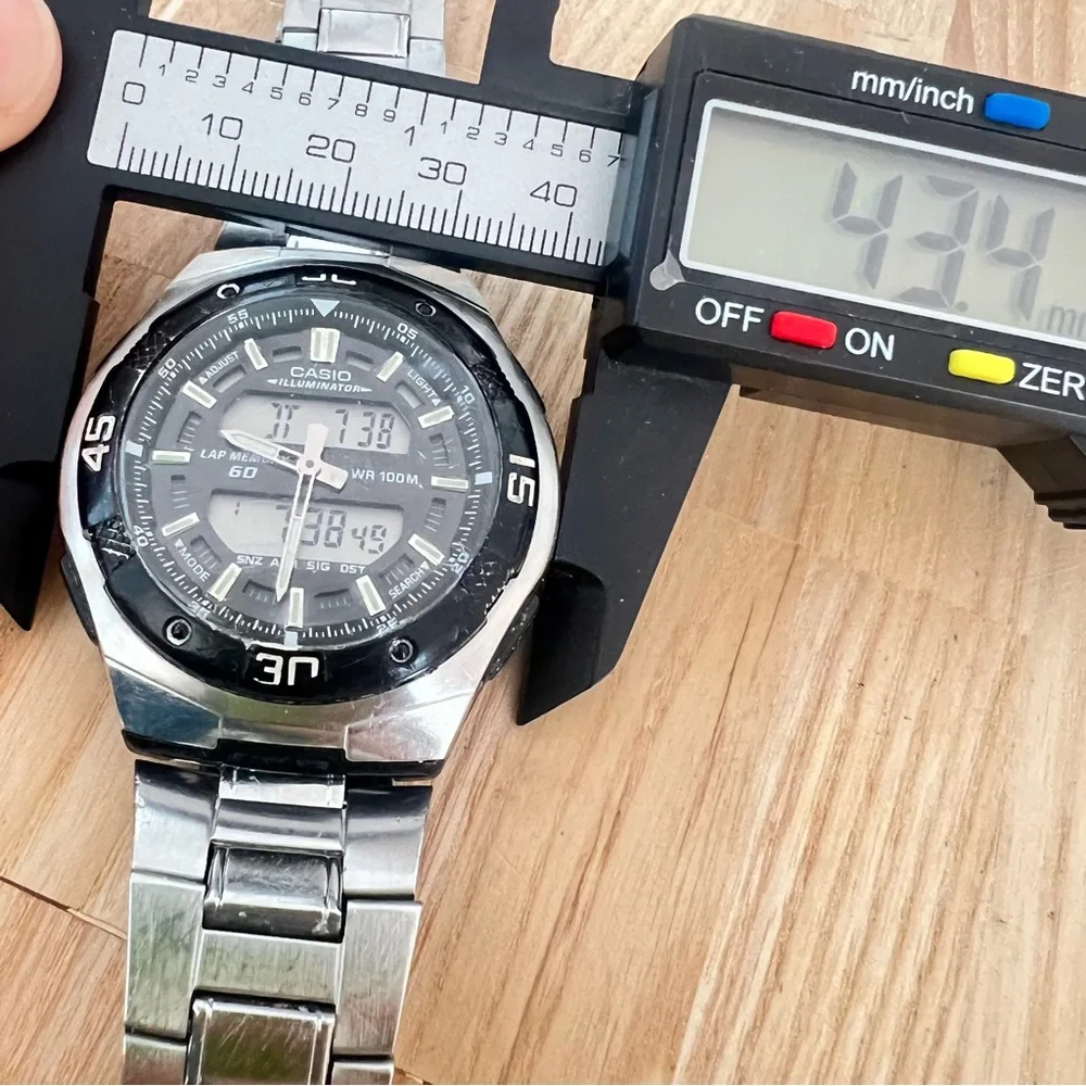 Casio Men's Silver Watch with Black Dial